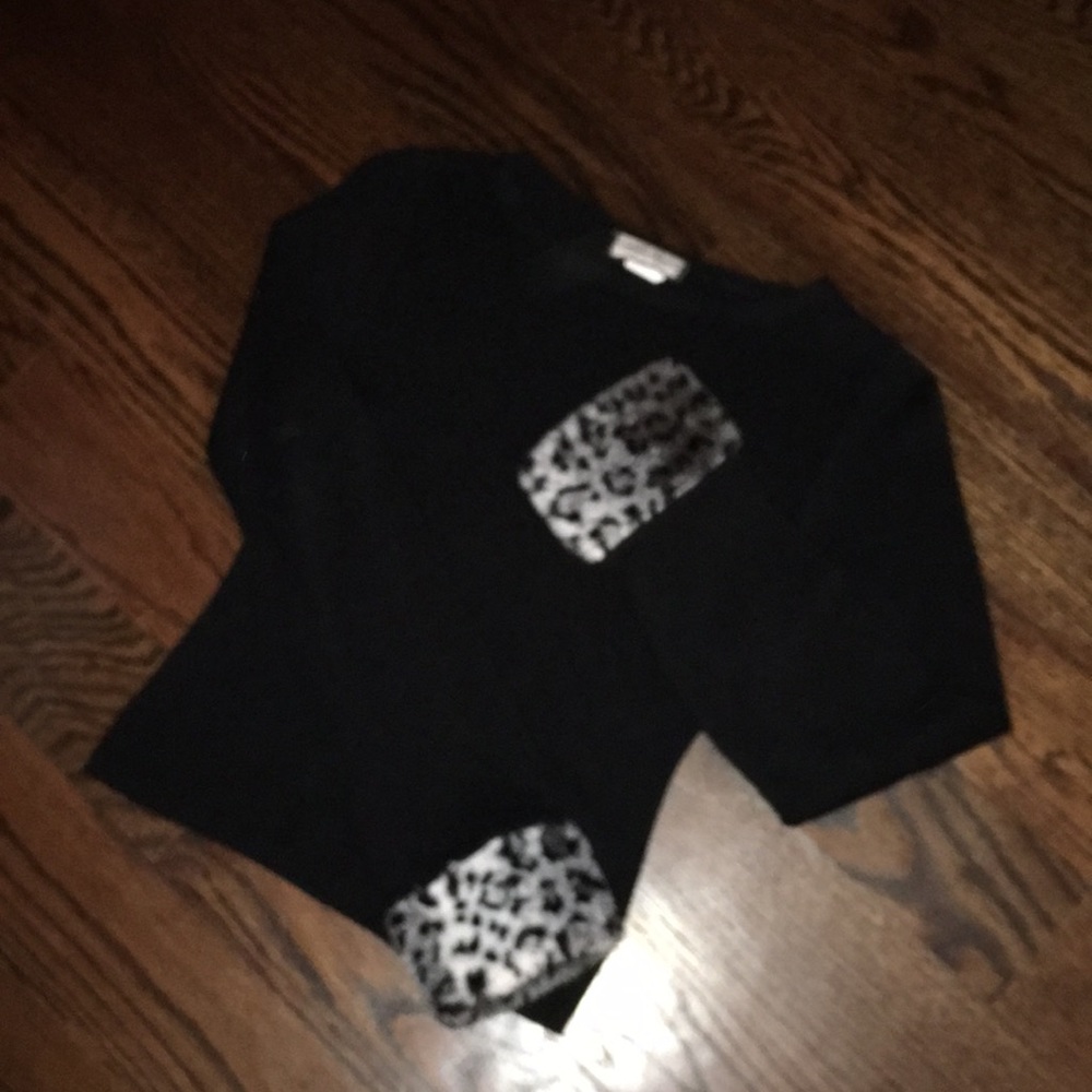 Black sweater with animal print cuffs